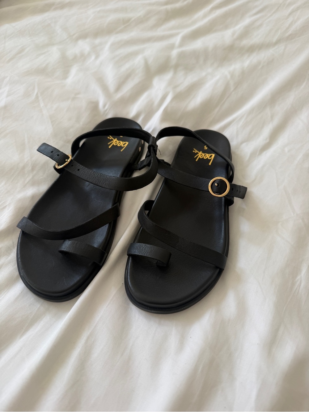 Beek Black Leather Strappy Sandals with Gold Buckle